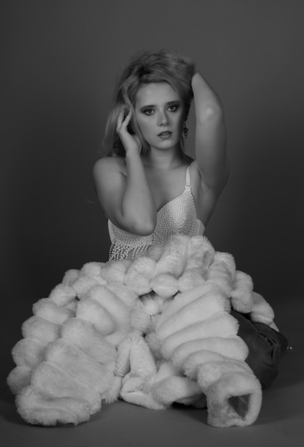 Monochrome portrait in sculptural ruffles